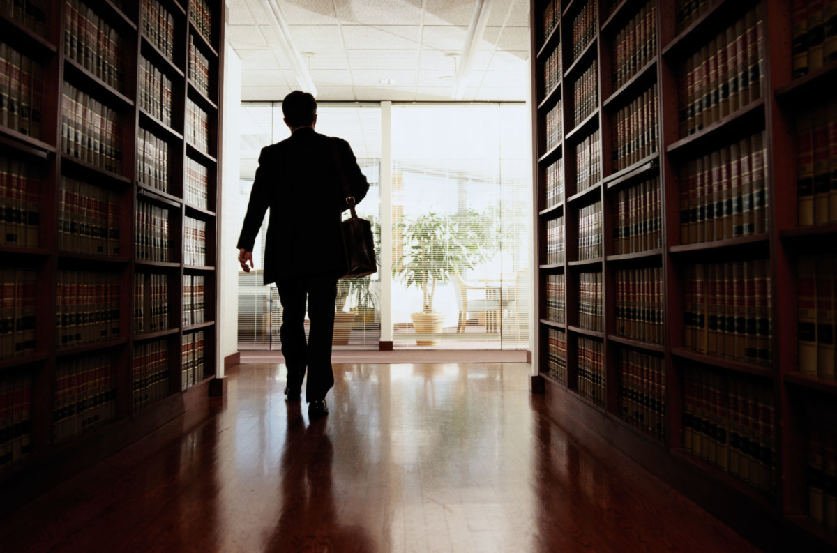 Lawyer leaving legal library