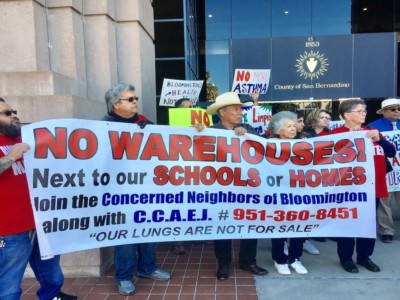 Bloomington residents and environmental advocates gathered outside the San Bernardino County Government Center in February 2018 to protest warehouse development plans.