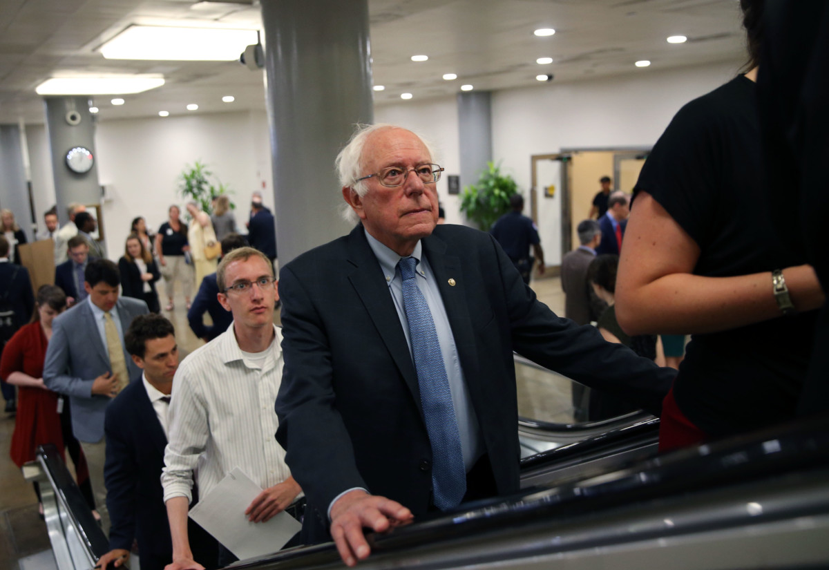 Sen. Bernie Sanders speaks to reporters as he arrives for the weekly Senate Democrat's policy luncheon at Capitol Hill on July 24, 2018, in Washington, DC.