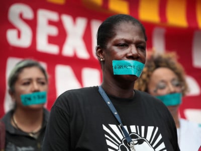 McDonald's workers are joined by other activists as they march toward the company's headquarters to protest sexual harassment at the fast-food chain's restaurants on September 18, 2018, in Chicago, Illinois.