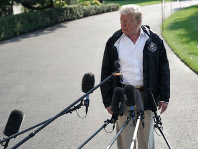 Donald Trump speaks to members of the media prior to a Marine One departure at the south lawn of the White House September 19, 2018, in Washington, DC.