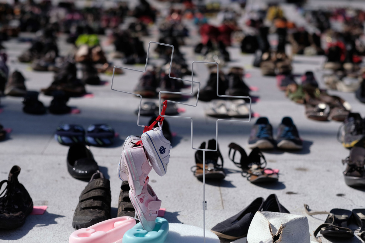 Shoes are displayed in memory of those killed by Hurricane Maria in front of the Puerto Rican Capitol in San Juan on June 1, 2018.