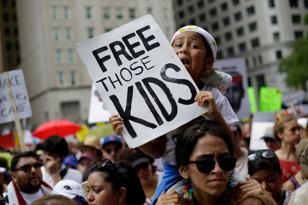Demonstrators protest against Immigration and Customs Enforcement (ICE) and the Trump administration's immigration policies at Daley Plaza, June 30, 2018, in Chicago, Illinois.