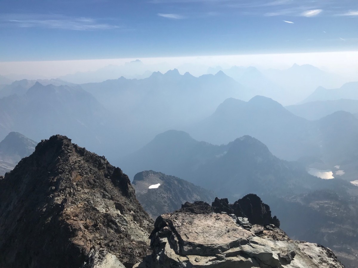 Smoke from wildfires in British Columbia, Eastern Washington and Montana enshrouds the Cascade Mountains of Washington State. In the Pacific Northwest, experiencing weeks on end of wildfire smoke during the summer months has become the “new normal.”