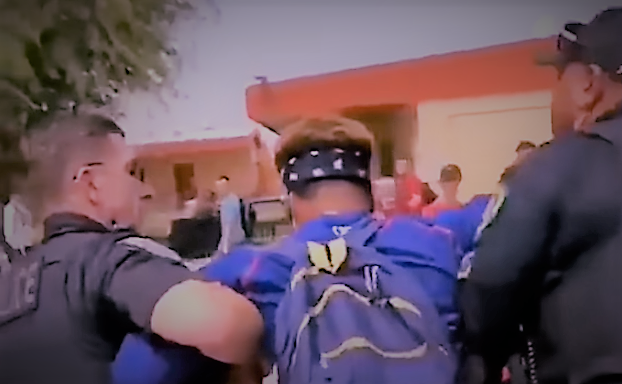 A Black student at Apache Junction High School in Arizona was arrested by police on August 10, 2018, for refusing to remove his bandana.
