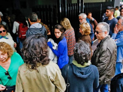 People queue to vote during general elections, in Sao Paulo, Brazil, on October 7, 2018.