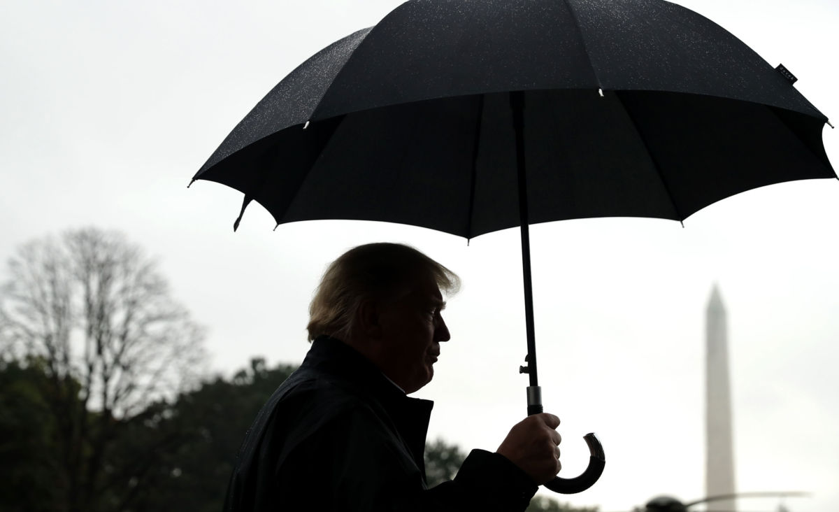 President Trump talks to reporters before leaving the White House, October 15, 2018, in Washington, DC.