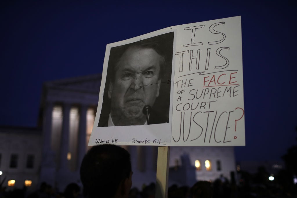 Protesters demonstrate against Supreme Court Justice Brett Kavanaugh outside the US Supreme Court on October 3, 2018, in Washington, DC.