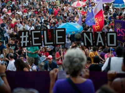 Demonstrators take part in a protest against Brazilian right-wing presidential candidate Jair Bolsonaro, called by a social media campaign under the hashtag #EleNao (NotHim), in Rio de Janeiro, Brazil, on October 20, 2018.