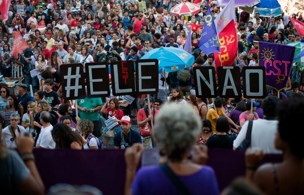 Demonstrators take part in a protest against Brazilian right-wing presidential candidate Jair Bolsonaro, called by a social media campaign under the hashtag #EleNao (NotHim), in Rio de Janeiro, Brazil, on October 20, 2018.
