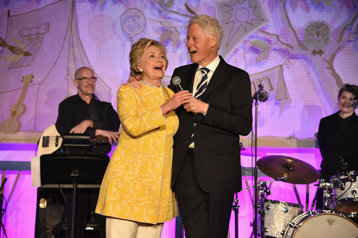 Former United States Secretary of State Hillary Clinton and President Bill Clinton speak onstage during the SeriousFun Children's Network Gala at Pier 60 on May 23, 2017, in New York City.
