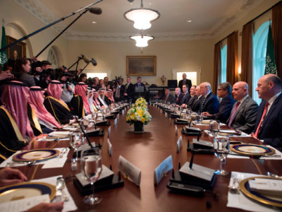 Donald Trump holds a lunch meeting with Saudi Arabia's Crown Prince Mohammed bin Salman (center left) and members of his delegation in Washington, DC, on March 20, 2018.