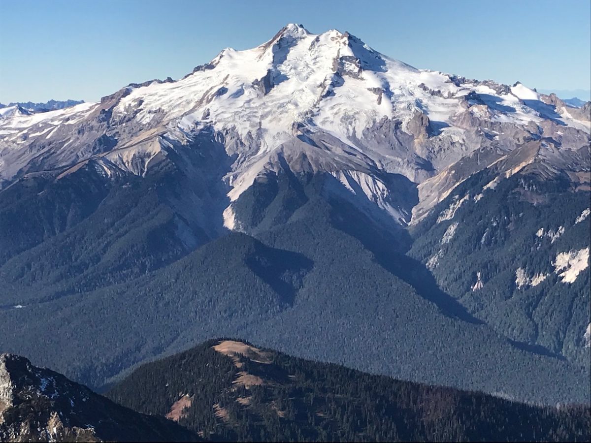 Glacier Peak in the central Cascade Mountains, seen from the East. The rapid retreat of the glaciers on this 10,541-foot mountain is starkly apparent in this photo of the fourth-highest mountain in Washington State.