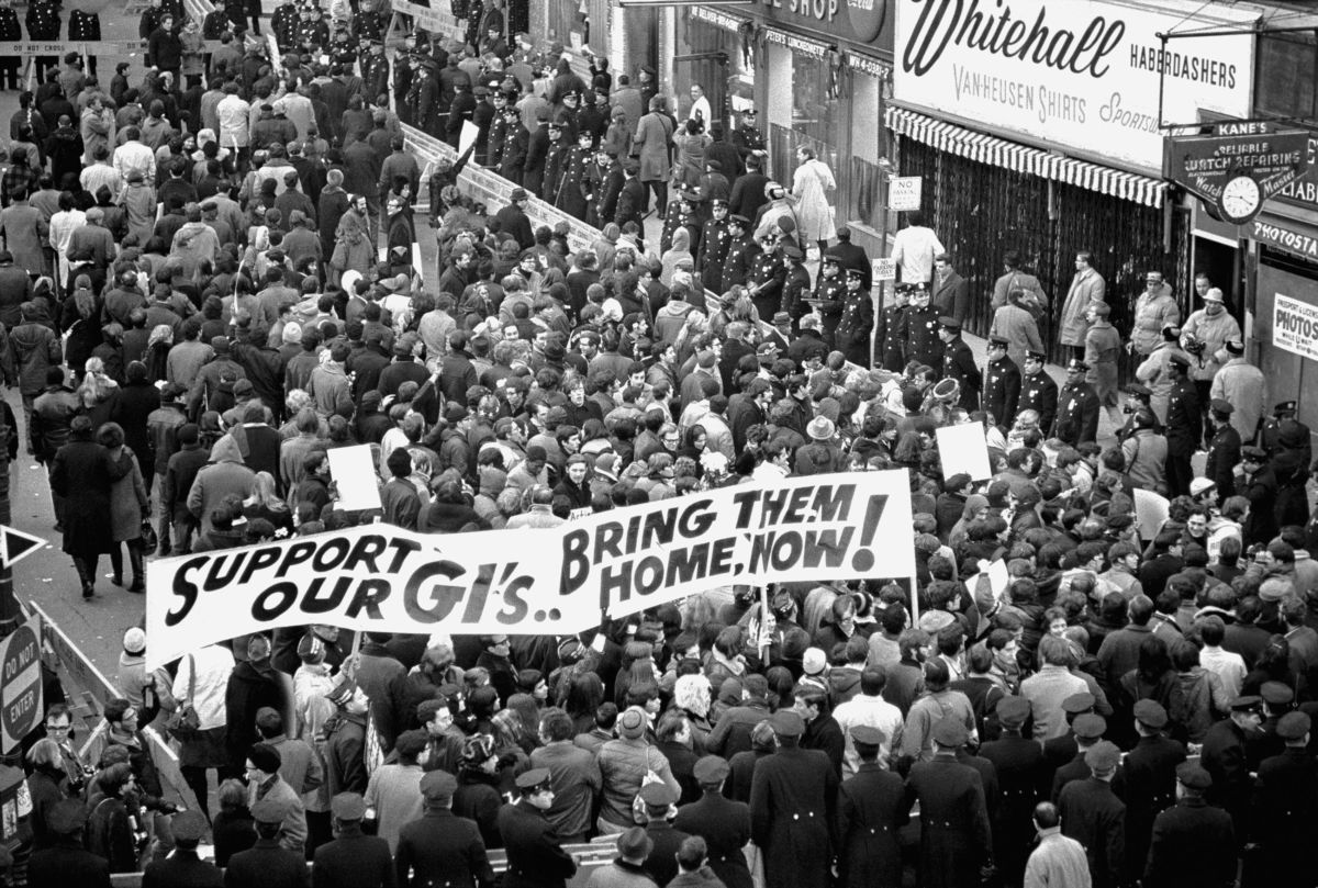 "Stop the Draft" demonstrators mass for the second straight day outside the armed forces induction center on Whitehall Street, New York, December 6, 1967. More than 2,000 antiwar demonstrators, chanting "Hell no, we won't go!" marched on the center before dawn.