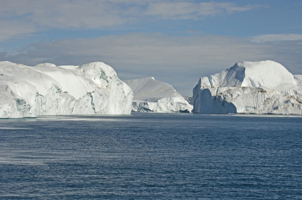 An iceberg swarm off the mouth of the Ilulissat Icefjord, West Greenland. Ice discharge from Greenland has increased more than 500 percent since 2000.