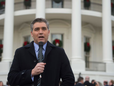 Jim Acosta, senior White House correspondent for CNN, speaks on camera at the South Lawn of the White House in Washington, DC, on December 20, 2017.