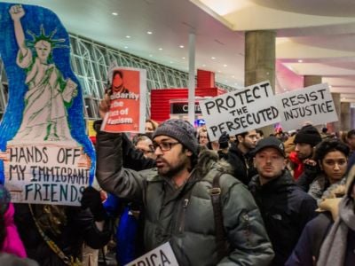 People protest the Trump administration’s travel ban at Kennedy International Airport in January 2017. The inspiration for the Yemeni bodega strike came from the JFK protests.