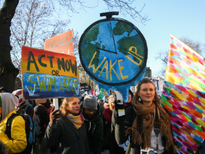 Activists attend the March for Climate which took place during COP24, the 24th Conference of the Parties to the United Nations Framework Convention on Climate Change, in Katowice, Poland, on December 8, 2018.