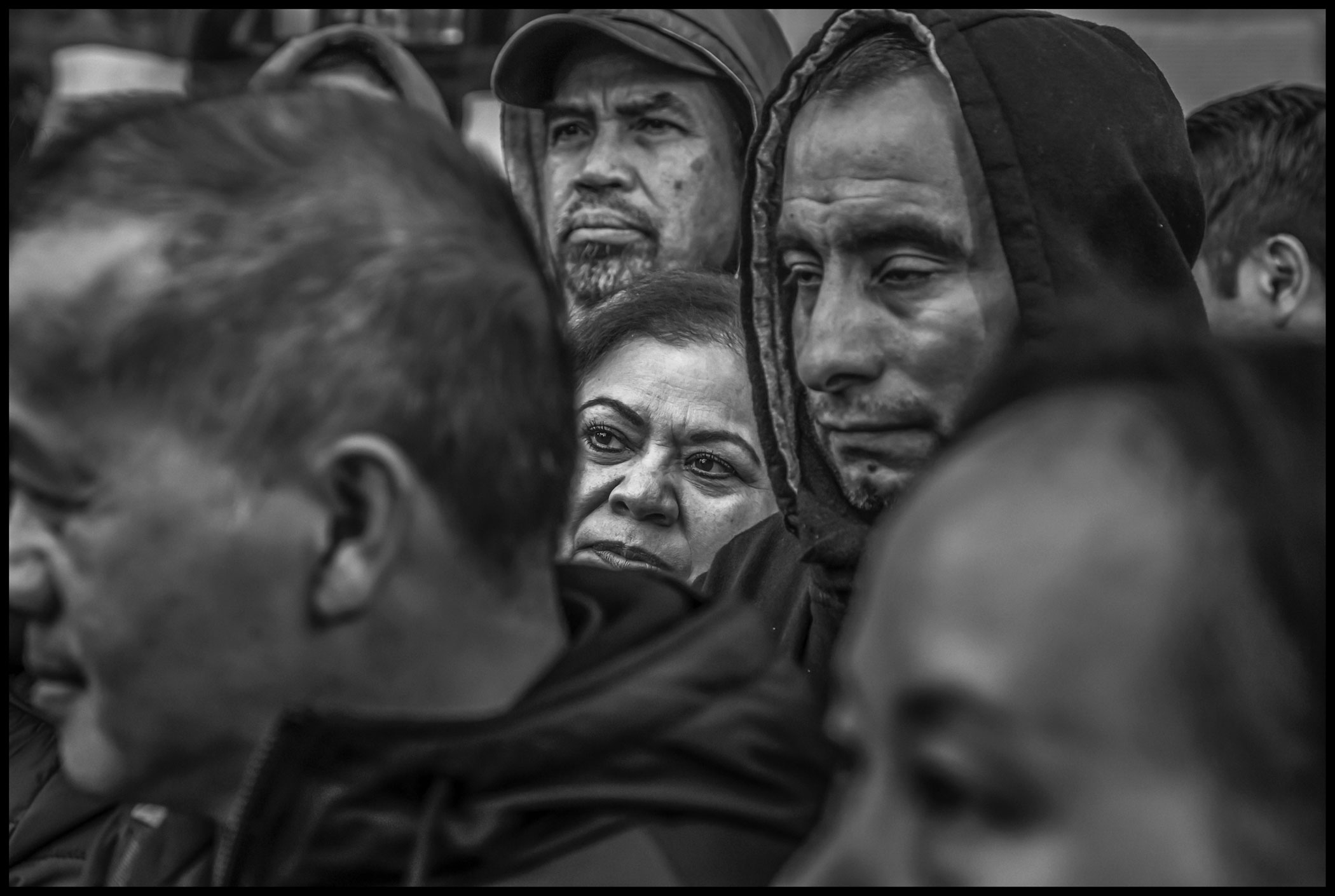 Saint Francis strikers listen to an outline of the strike settlement on the picket line on the last day of the strike.