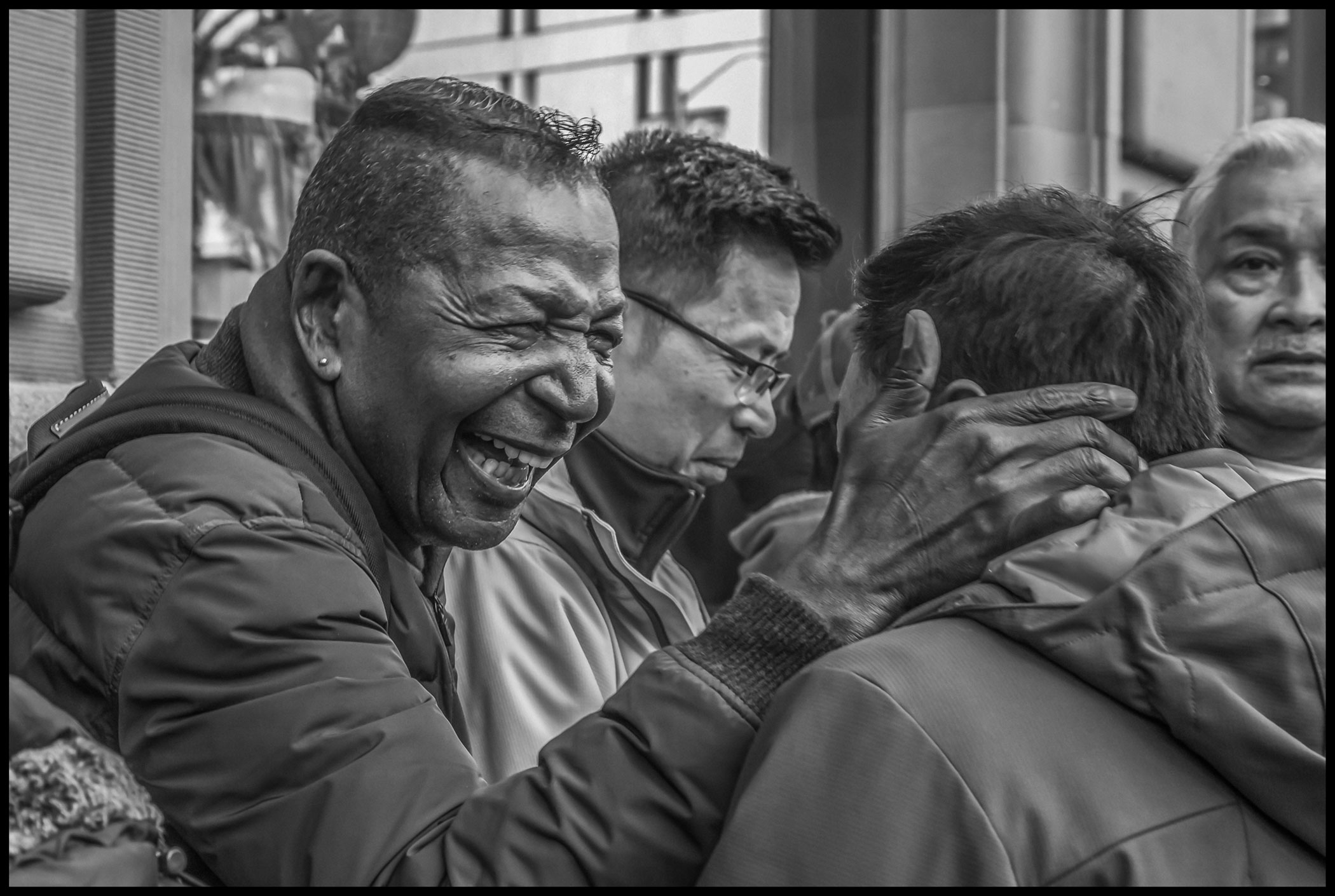 Striker Richard Mason, one of the longest-term workers at the Saint Francis, shows his happiness on hearing that a settlement has been reached in the Marriott strike.
