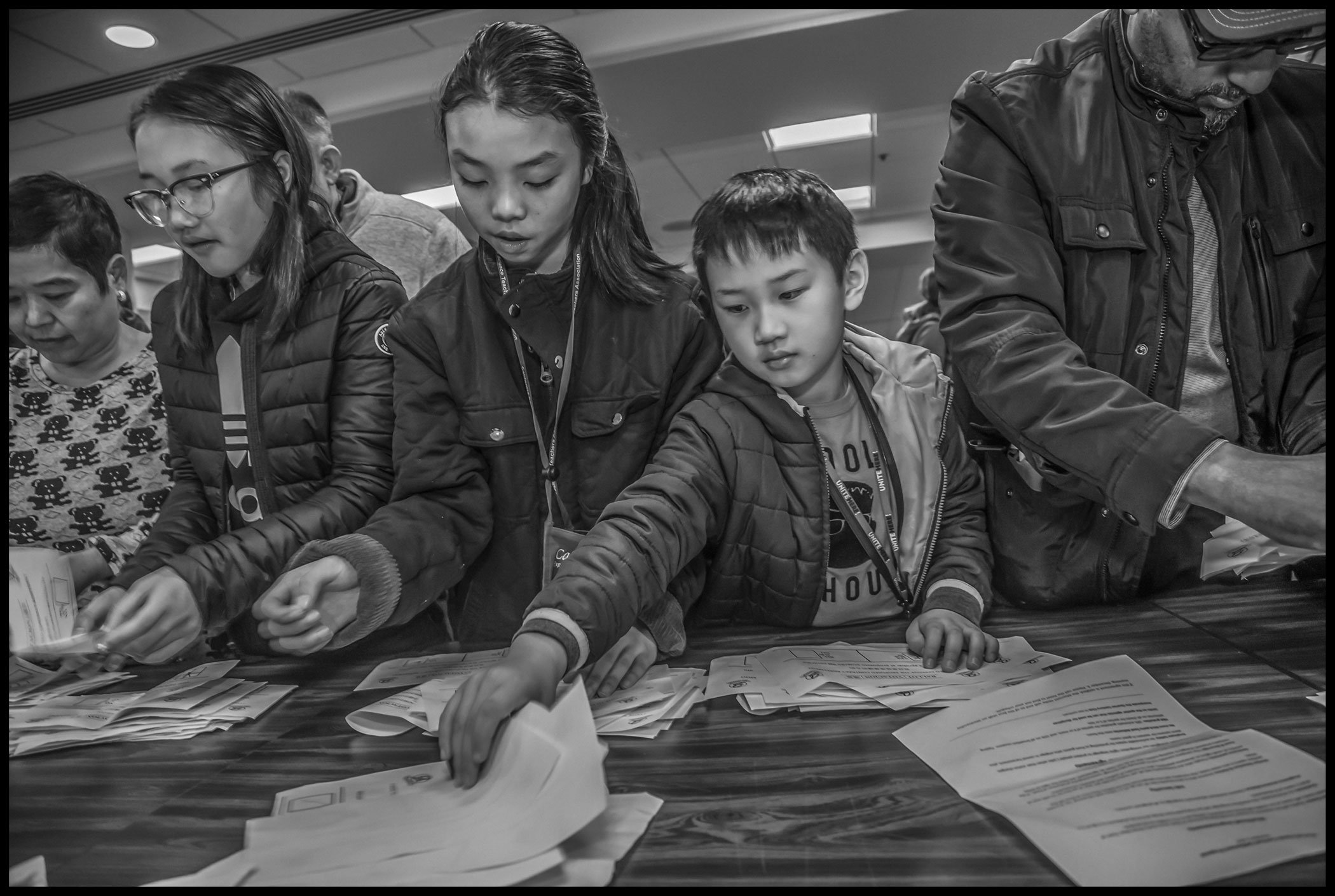 The children of strikers help count the votes on the ratification of the contract settling the Marriott strike in San Francisco.