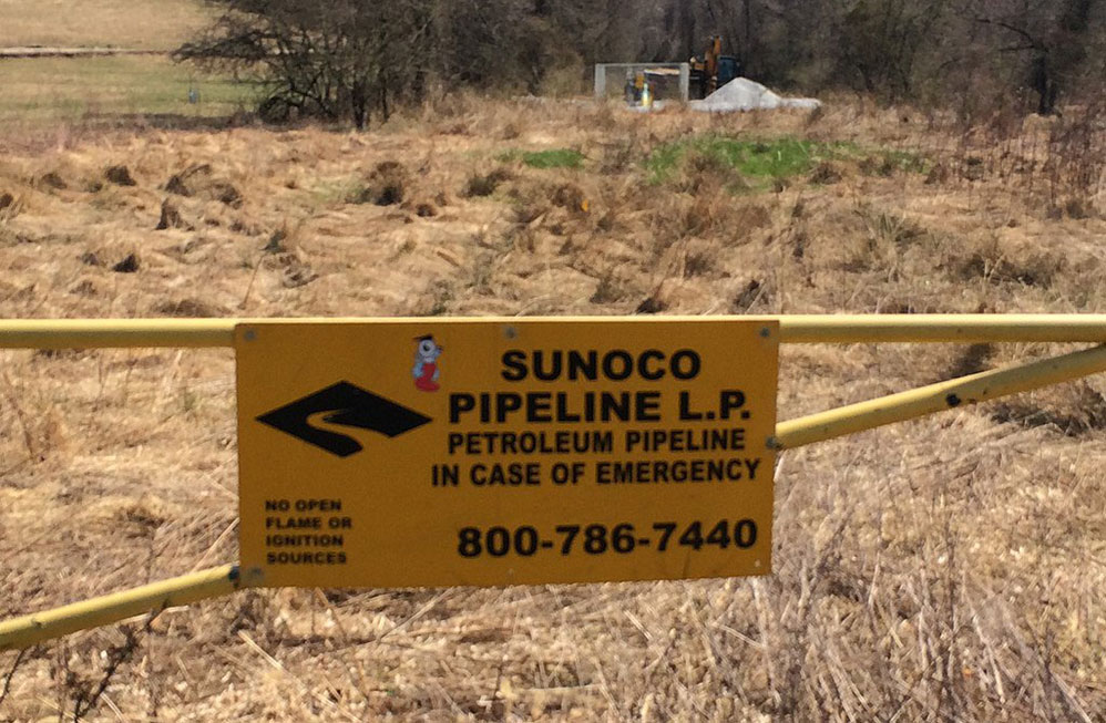 Sunoco Pipeline sign near Mariner East II pipeline site in Delaware County, Pennsylvania.