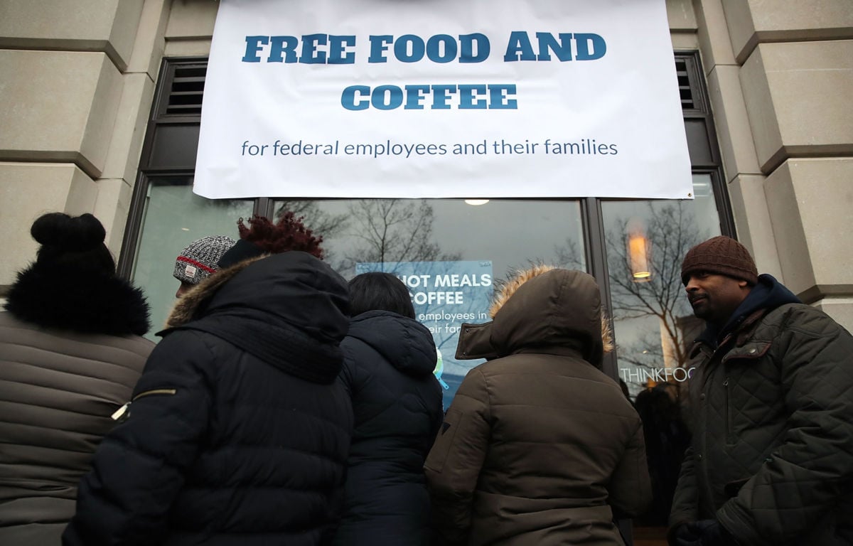 People line up to get a free lunch at a pop-up eatery for furloughed government employees and their families, on January 16, 2019, in Washington, DC.