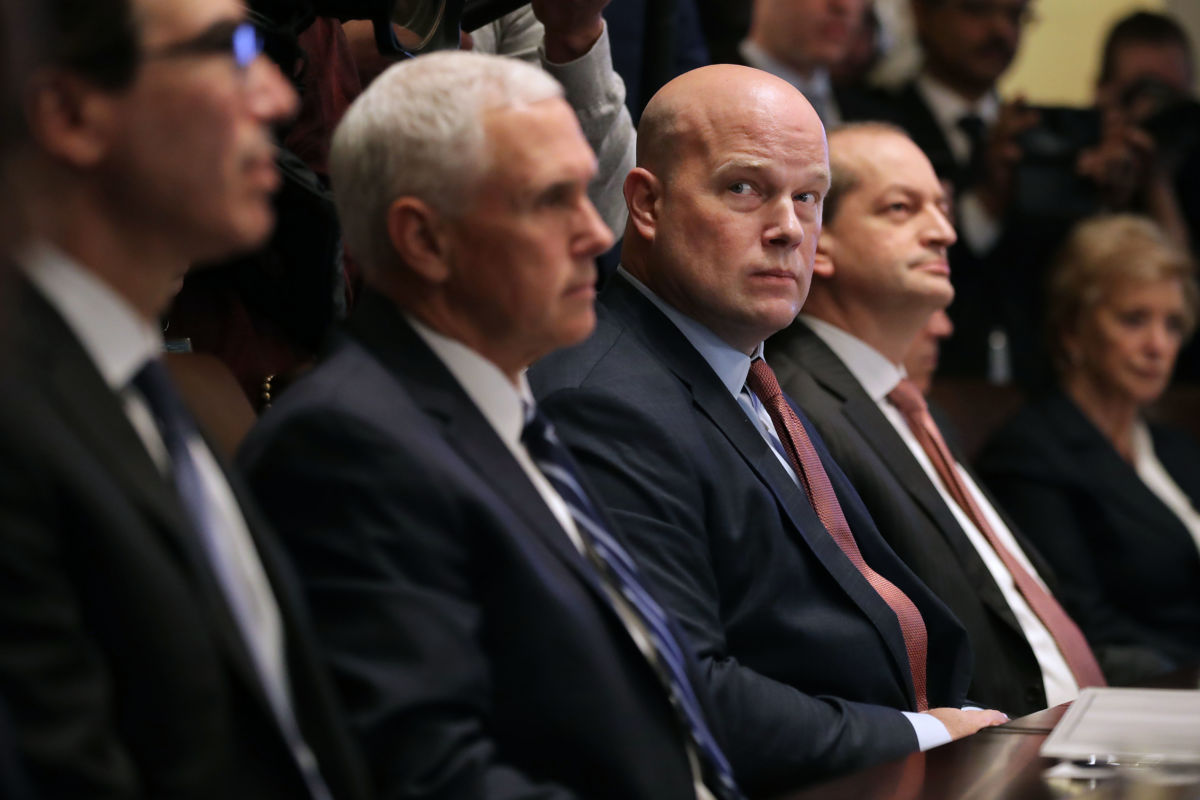 Treasury Secretary Steven Mnuchin, Vice President Mike Pence, Acting US Attorney General Matthew Whitaker, Labor Secretary Alex Acosta and other members of President Trump's cabinet meet at the White House January 2, 2019, in Washington, DC.