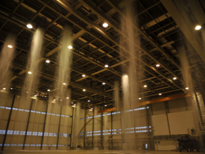 Poisonous foam fills the hangar at Ramstein Air Base, Germany, during a biennial fire suppression system test, February 19, 2015.