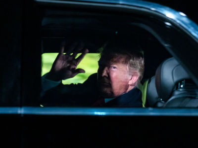 President Trump sits in the presidential limo as he departs the White House for Capitol Hill on February 5, 2019, in Washington, DC.