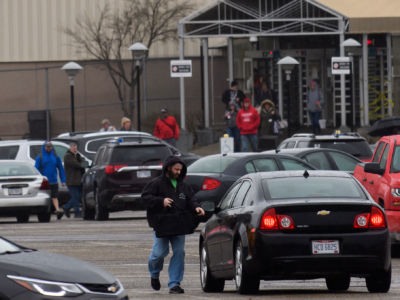 Employees leave the GM Lordstown Plant on November 26, 2018, in Lordstown, Ohio. GM said it would end production at five North American plants including Lordstown, and cut 15 percent of its salaried workforce.
