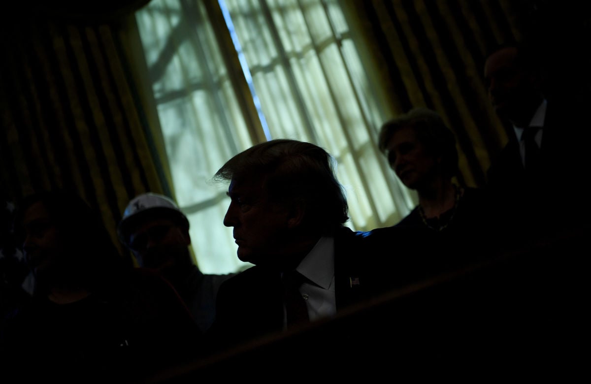 President Trump pauses while speaking during an executive order signing in the Oval Office of the White House on January 31, 2019, in Washington, D.C. Trump may still declare a national emergency — or plunder disaster funds to get his wall.