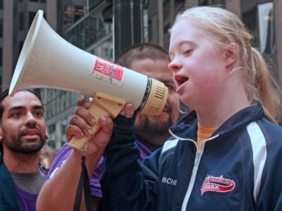 Under the current special education system, students with disabilities tend to get segregated into classrooms with fewer resources. Here, Chicagoans protest cuts in special education on August 26, 2015.