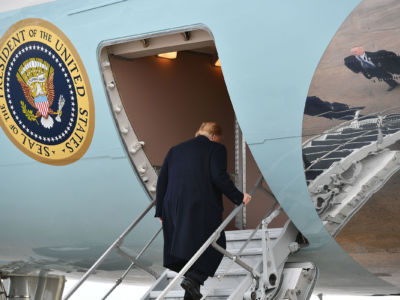 President Trump boards Air Force One before departing from Andrews Air Force Base in Maryland on January 14, 2019. Several polls show Trump’s bid for re-election will be difficult.