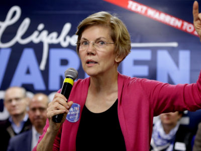 Sen. Elizabeth Warren speaks at a campaign stop in Brockton, Massachusetts, on November 3, 2018.