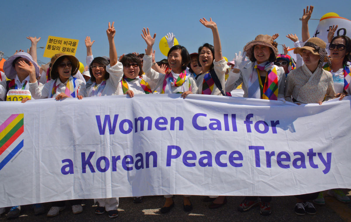 Women peacemakers march in Paju, South Korea, after crossing the demilitarized zone (DMZ) on May 24, 2015, for the International Women’s Day for Peace and Disarmament.