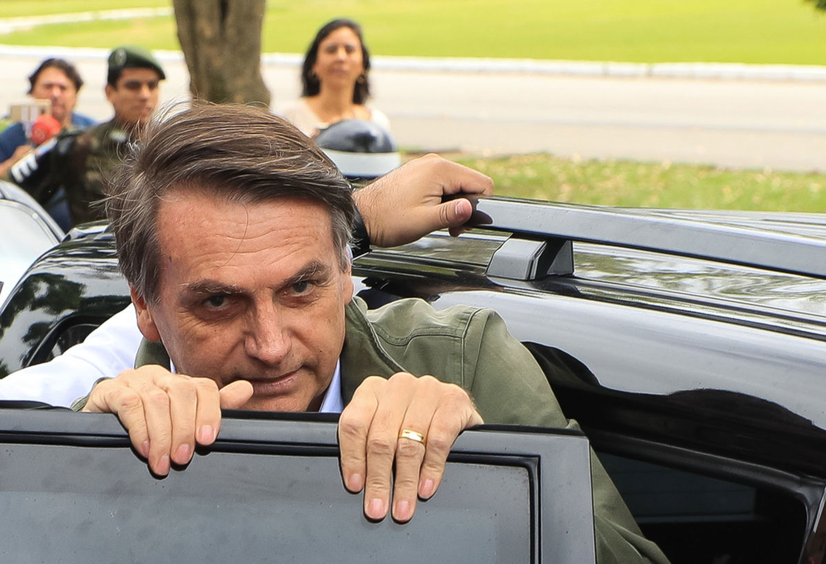 Brazilian President Jair Bolsonaro enters a car in Rio de Janeiro, Brazil