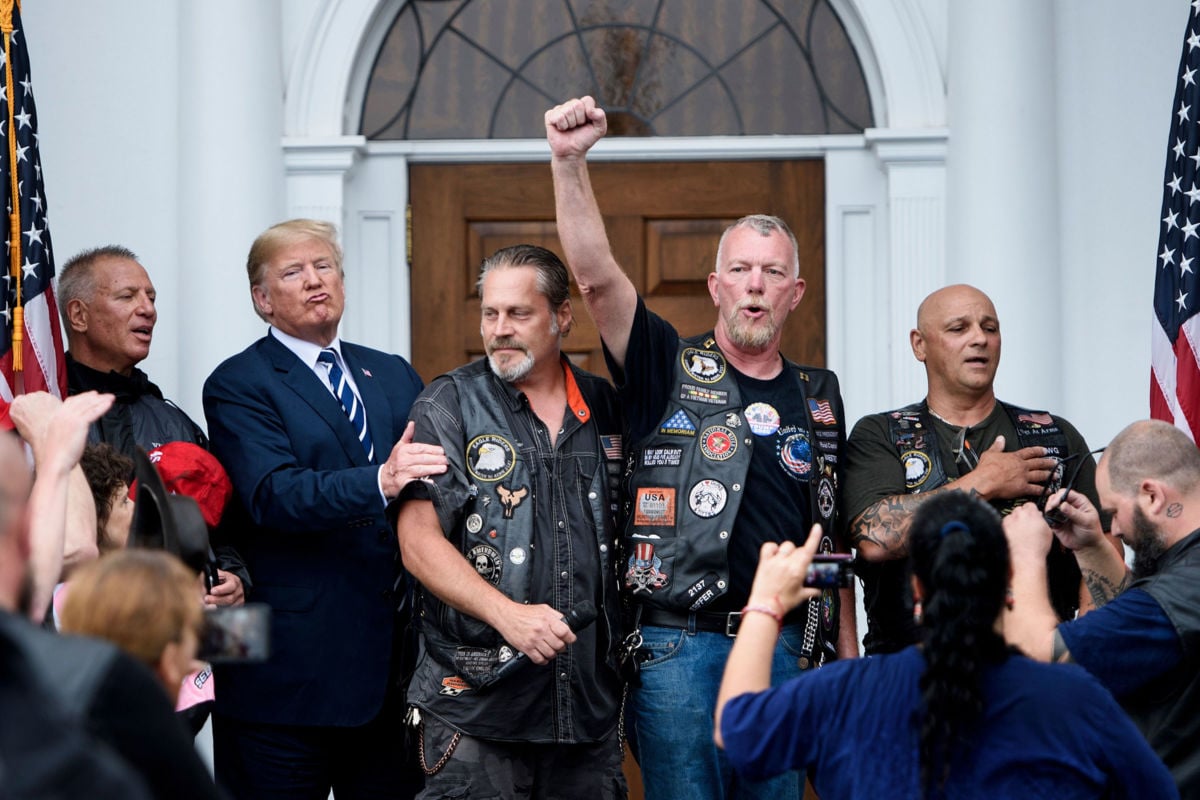 President Donald Trump stands with Bikers for Trump at Trump National Golf Club.