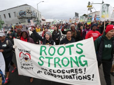 Striking teachers, students and supporters march towards rally in Oakland, California.