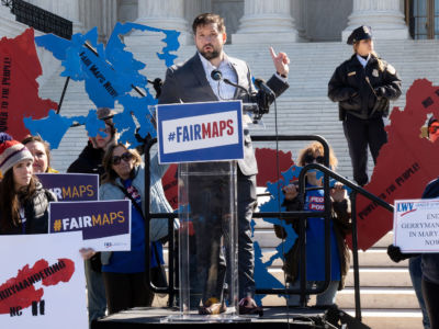 As the U.S. Supreme Court prepared to hear arguments in two cases related to partisan gerrymandering, people rallied outside to call for an end to the practice on March 26, 2019.