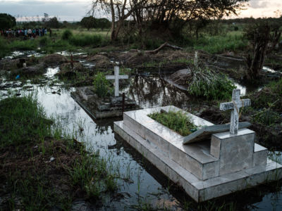 Flooded graves are seen following a strong cyclone that hit Beira, Mozambique, on March 20, 2019. Five days after tropical cyclone Idai cut a swathe through Mozambique, Zimbabwe and Malawi, the confirmed death toll stood at more than 300 and hundreds of thousands of lives were at risk, officials said.