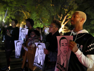 Black Lives Matter protesters march through the streets as they demonstrate the decision by Sacramento District Attorney to not charge the Sacramento police officers who shot and killed Stephon Clark last year on March 04, 2019, in Sacramento, California.