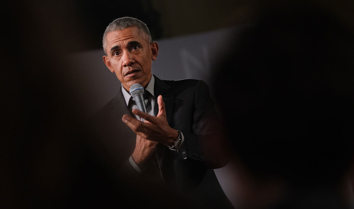 Former President Barack Obama speaks in a town hall-styled session in Berlin, Germany. ﻿