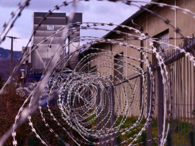 Razor wire fence outside of a prison