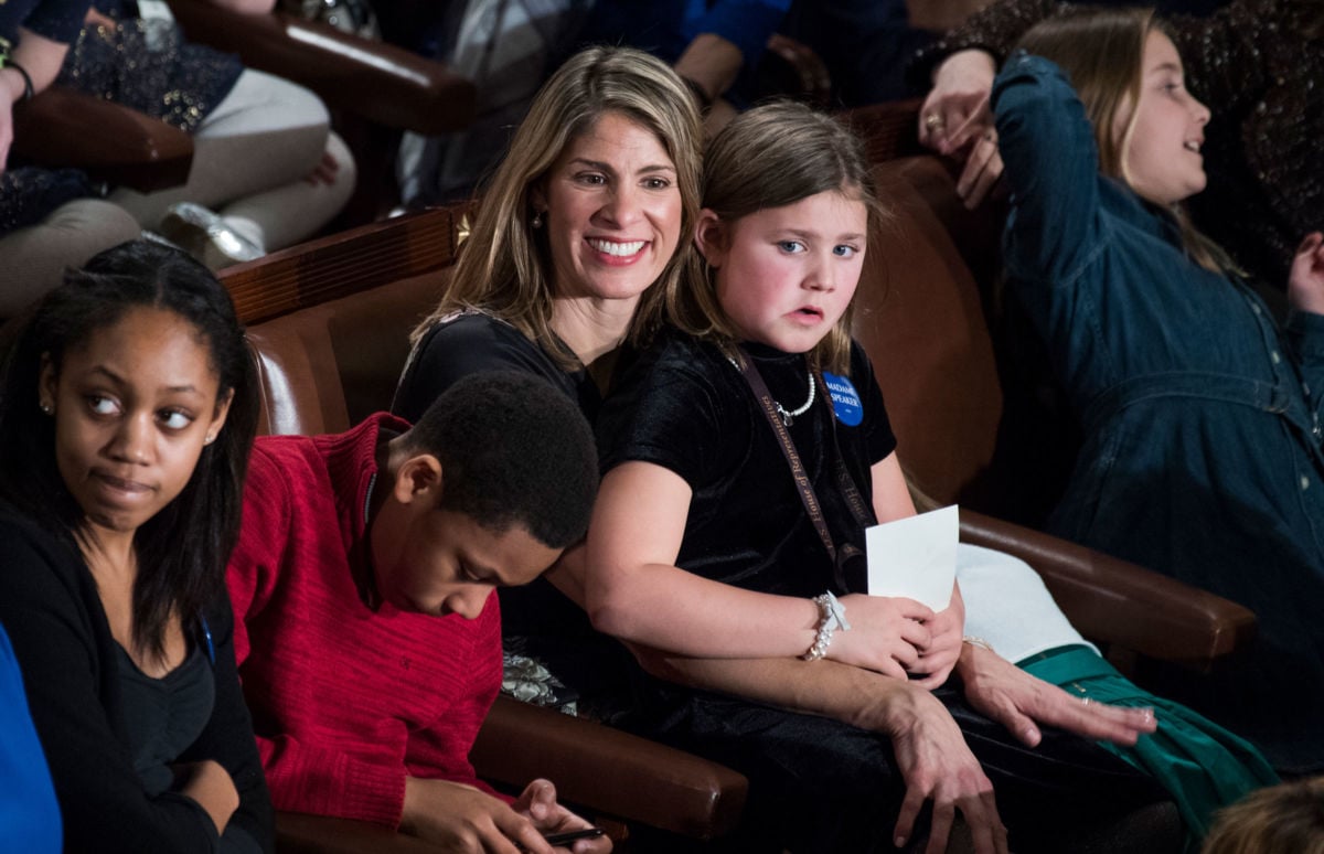 Rep. Lori Trahan (D-Massachusetts) and her daughter are seen in the Capitol's House chamber before members were sworn in on the first day of the 116th Congress on January 3, 2019.