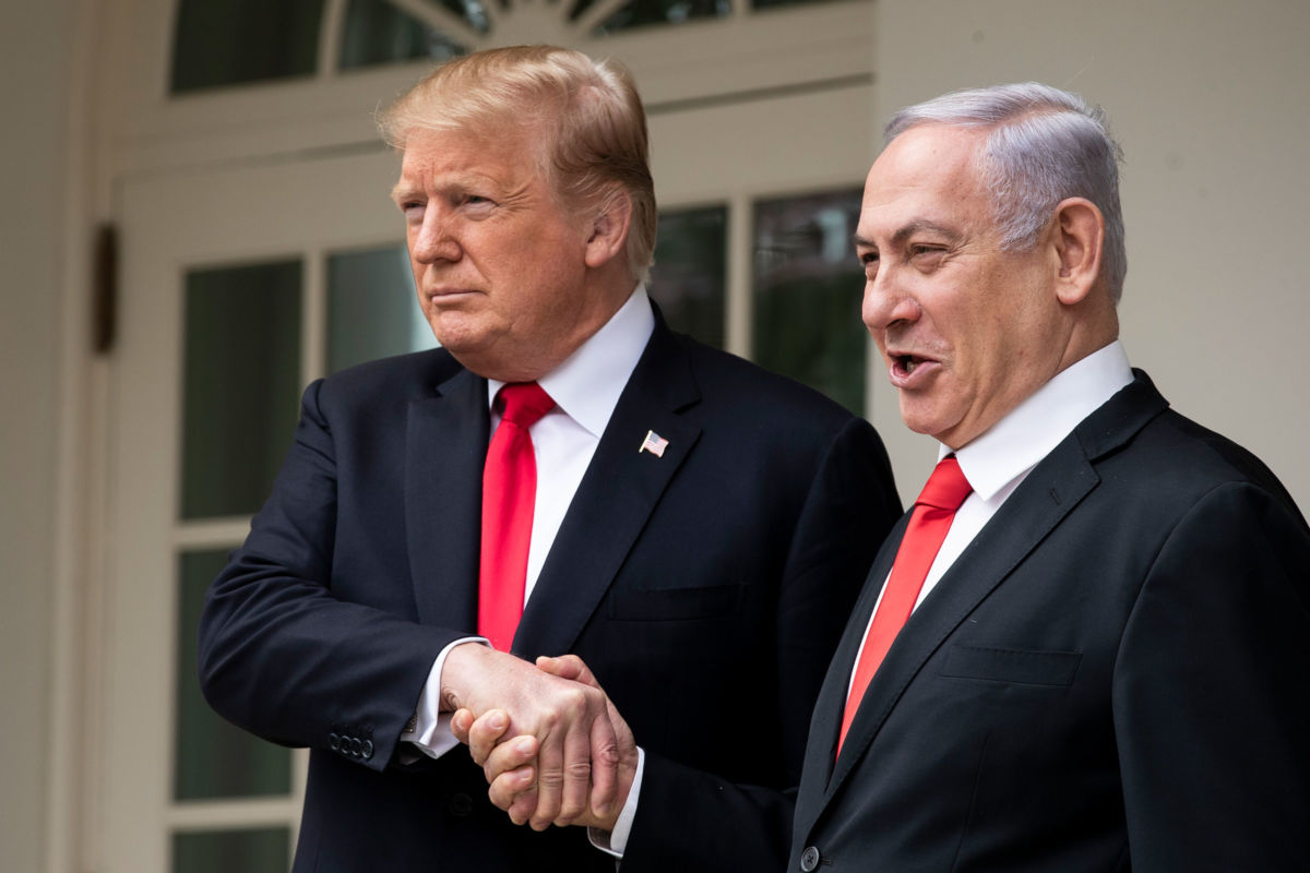 President Trump and Prime Minister of Israel Benjamin Netanyahu shake hands while walking through the colonnade prior to an Oval Office meeting at the White House, March 25, 2019, in Washington, D.C.