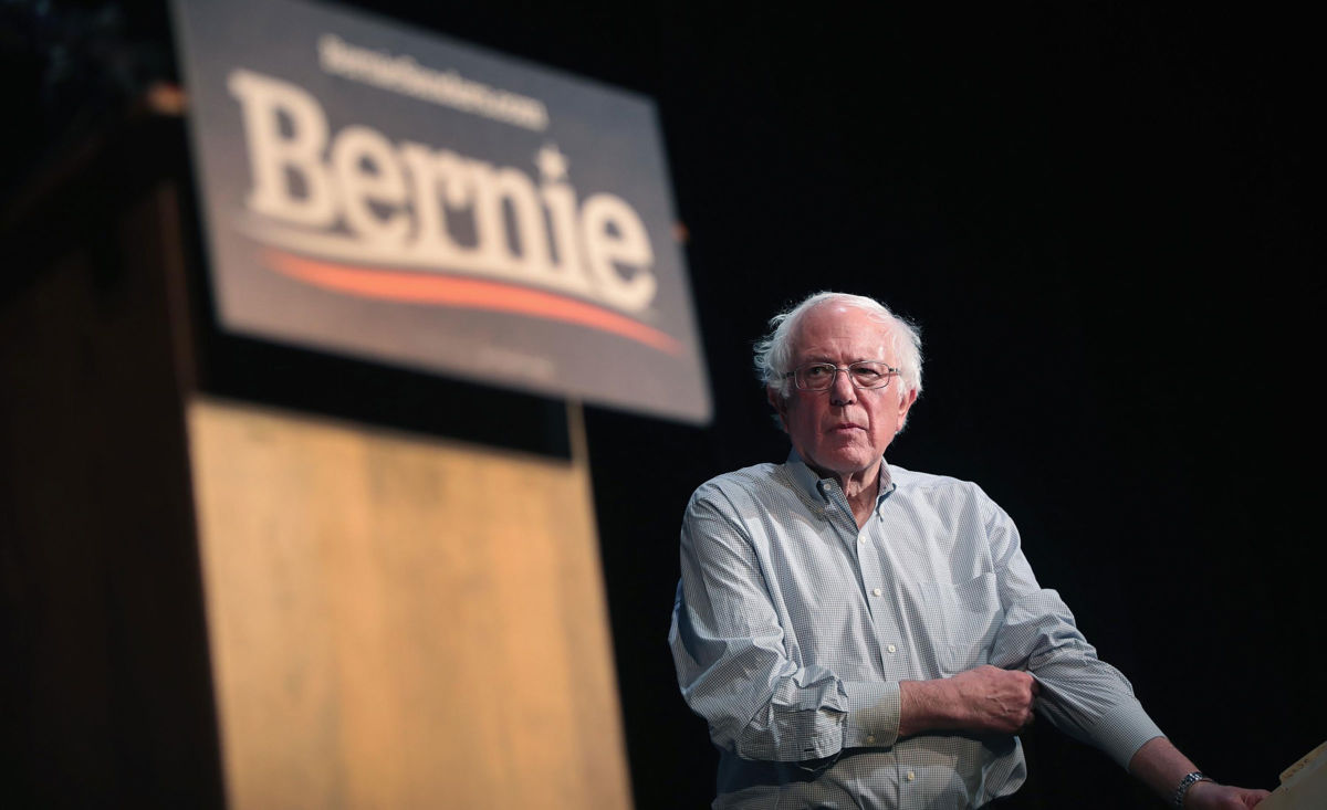 Democratic presidential candidate Sen. Bernie Sanders approaches podium at rally