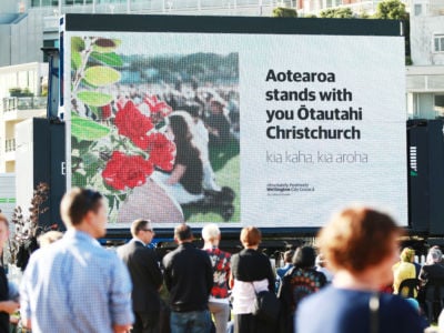 A message to Christchurch is displayed on a big screen during a National Remembrance Service at Waitangi Park on March 29, 2019, in Wellington, New Zealand.