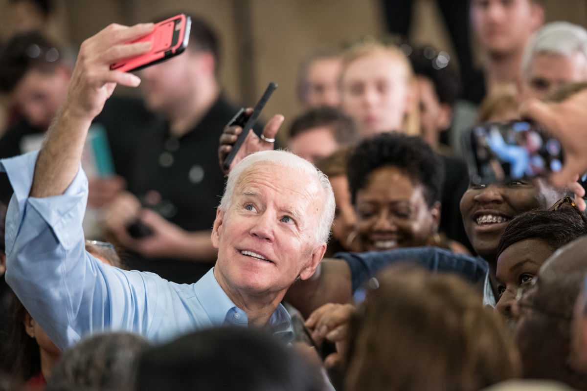 Joe Biden takes a selfie with supporters