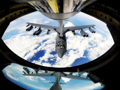 A U.S. Air Force B-52 Stratofortress aircraft receives fuel.